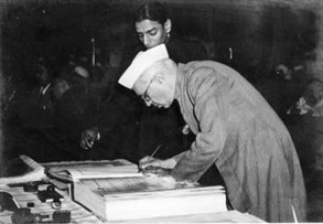 Jawaharlal _nehru _signing _indian _constitution